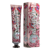 Marvis toothpaste tube and packaging with floral design on a white background